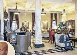  ?? Picture: Getty Images ?? The Taj hotel lobby in Cape Town, where State Security Minister Bongani Bongo, left, has been staying.