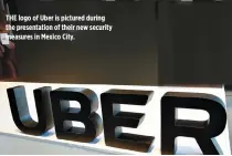  ??  ?? THE logo of Uber is pictured during the presentati­on of their new security measures in Mexico City.