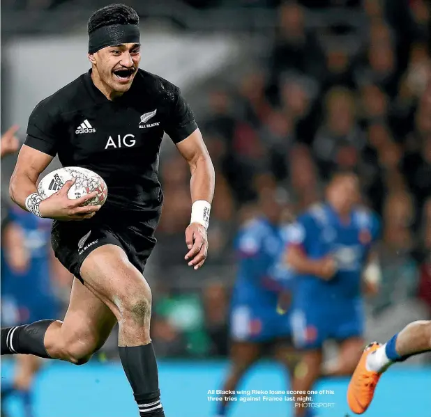  ??  ?? All Blacks wing Rieko Ioane scores one of his three tries against France last night.