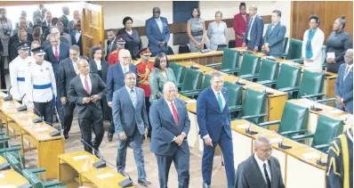  ?? FILE ?? Prime Minister Andrew Holness and Opposition Leader Dr Peter Phillips together lead members of the Lower House for the opening of Parliament earlier this year. Steve Lyston proposes that a theocracy is perhaps the best system of government for the country.