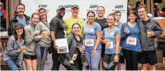  ?? Benchmark, A Global Hospitalit­y Company ?? Employees of Benchmark, A Global Hospitalit­y Company, supported Montgomery County-Meals on Wheels by participat­ing in a 5k run. The company is an eight-time Chronicle Top Workplaces winner.