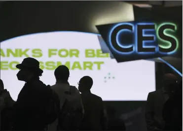  ?? (AP PHOTO/JOE BUGLEWICZ) ?? Attendees wait for the main show floor to open at the CES tech show Wednesday, Jan. 5, 2022, in Las Vegas.