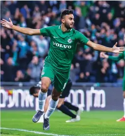  ?? (Maor Elkaslasi) ?? MACCABI HAIFA captain Muhamad Awad celebrates after scoring the first of his two goal in the Greens’ dramatic 3-2 victory over Hapoel Tel Aviv in Israel Premier League action on Monday night.