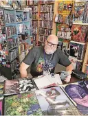  ?? [PHOTO BY MATTHEW PRICE, THE OKLAHOMAN] ?? Jerry Bennett, seen here at a comic store appearance, is a featured guest at ContempCon.