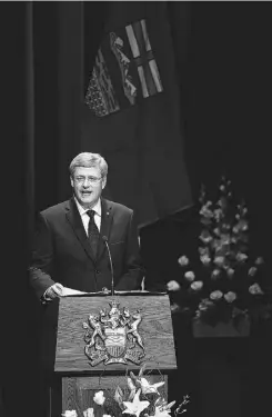  ?? Government of Alberta/ The Canadian Press ?? Prime Minister Stephen Harper delivers his address during the state memorial service.