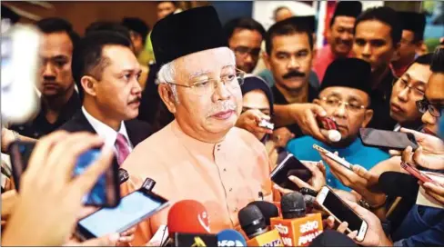  ?? MOHD RASFAN/AFP ?? Najib Razak, the then Prime Minister of Malaysia, speaks to the media after an event in Kuala Lumpur on July 21, 2016.