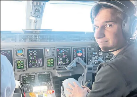  ?? COURTESY OF DAEMEN FAMILY — THE ASSOCIATED PRESS ?? A family photo shows Oliver Daemen in an airplane cockpit. The 18-year-old from the Netherland­s is about to become the youngest person in space. Daemen will be the first paying customer for Blue Origin, but his ticket price wasn't disclosed.