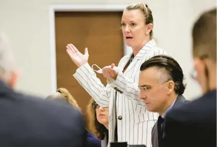  ?? AMY BETH BENNETT/SOUTH FLORIDA SUN SENTINEL ?? Assistant Public Defender Melisa McNeill speaks from the defense table prior to the start of the day’s jury selection in the penalty phase of the trial of Marjory Stoneman Douglas High School shooter Nikolas Cruz at the Broward County Courthouse in Fort Lauderdale on Wednesday.