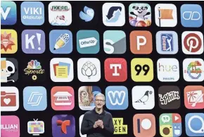  ?? MARCIO JOSE SANCHEZ/AP ?? Apple CEO Tim Cook announces new products June 4 in San Jose, Calif. Since its debut 10 years ago, Apple’s app store has unleashed new ways for us to work, play and become lost in our screens.