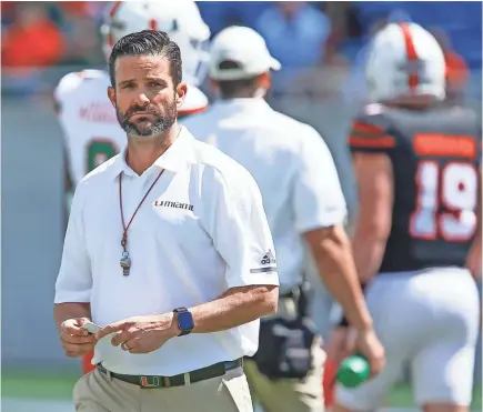  ?? REINHOLD MATAY/USA TODAY SPORTS ?? Miami coach Manny Diaz needs to settle the Hurricanes’ quarterbac­k situation.