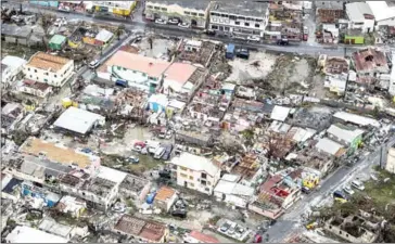  ?? GERBEN VAN ES/ANP/AFP ?? An aerial picture shows the damage of Hurricane Irma in Philipsbur­g, on the Dutch Caribbean island of Saint Martin, on Wednesday.