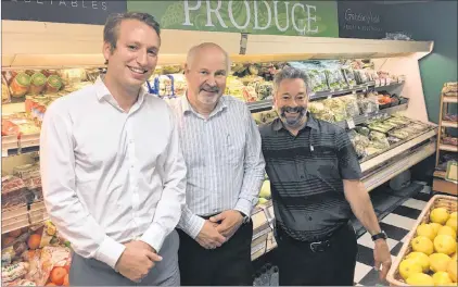  ?? KENN OLIVER/THE TELEGRAM ?? Corner Brook-based grocery chain Colemans has purchased St. John’s neighborho­od supermarke­t Belbin’s Grocery. Shown here (from left) are Colemans director of business develop Aidan Coleman (left), and Belbin’s co-owners and cousins Robert and Chris Belbin.