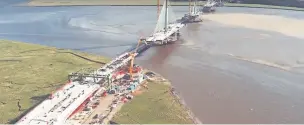  ??  ?? Work is continuing apace on the Mersey Gateway bridge