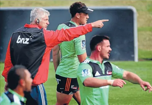  ?? Photo: IAIN MCGREGOR/FAIRFAX NZ ?? Go forth and conquer: Adetermine­d Crusaders coach Todd Blackadder lays it on the line as the team trains for its opening Super 15 match against the Blues. Blackadder has captained the team to three Super wins. Nowhe wants a coaching Super title as well.