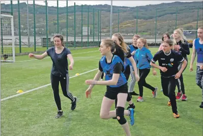  ?? 08_a17girlsru­gby02 ?? S1-3 pupils chase the ball in the Scottish Rugby #BeTheBestY­ou rugby taster session on Tuesday April 24.