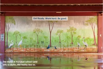 ??  ?? The mural at Aurukun school (and left) is idyllic, the reality less so.