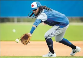  ?? NATHAN DENETTE THE CANADIAN PRESS ?? Shortstop Freddy Galvis wore No. 13 when he played with Philadelph­ia and San Diego, but in Toronto that number belongs to Lourdes Gurriel Jr.