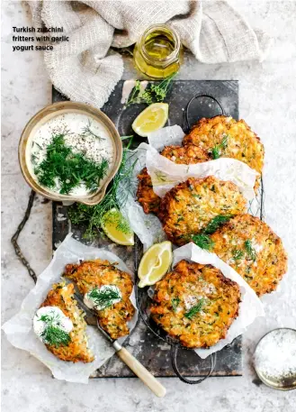  ??  ?? Turkish zucchini fritters with garlic yogurt sauce