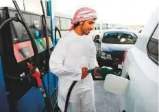  ?? Rex Features ?? An Adnoc petrol station in Abu Dhabi. The listing of Adnoc’s Distributi­on business, which manages petrol stations as well as convenienc­e stores across the UAE, is planned before the end of the year, one of the sources told Reuters.
