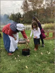  ?? SUBMITTED PHOTO ?? Hands-on activities include quill pen writing, candle dipping and 18th-century toys and games on Charter Day at the Daniel Boone Homestead on March 12.