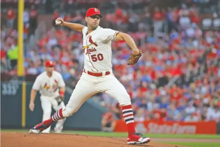  ?? AP FILE PHOTO/SCOTT KANE ?? St. Louis Cardinals pitcher Adam Wainwright was drafted 19 years ago by the Atlanta Braves, who traded him in 2003. Wainwright will start today as the Cardinals host the Braves with their NL Division Series tied 1-1.