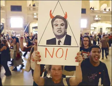  ?? REUTERS ?? A demonstrat­or participat­es in a protest against US Supreme Court nominee Brett Kavanaugh in New York City on Monday.