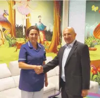  ??  ?? Norman Mifsud, Chief Officer HR & Corporate Services at MAPFRE MSV Life with Angele Cuschieri, Vice Chairperso­n of the Puttinu Cares Foundation