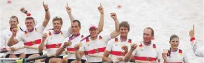  ?? AP FILES ?? Maximilian Reinelt (fifth from left) celebrates a gold medal with his Germany rowing crew at the 2012 Summer Olympics.