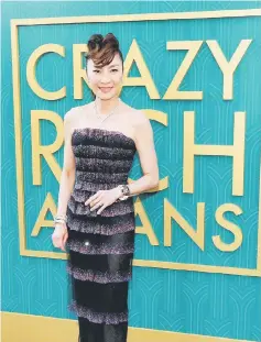  ??  ?? Cast member Tan Sri Michelle Yeoh poses at the premiere for ‘Crazy Rich Asians’ in Los Angeles, California, last month. — Reuters file photo