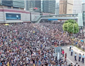  ??  ?? Pro-democracy protesters are seen gathering near the government headquarte­rs in Hong Kong in this file photo.