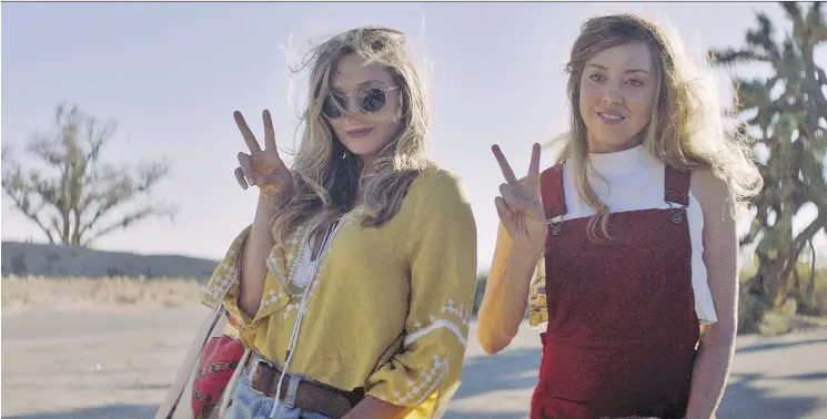  ?? THE CANADIAN PRESS ?? Elizabeth Olsen, left, and Aubrey Plaza star in Ingrid Goes West, a study in the dangers of social media.
