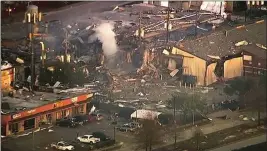  ?? KTRK-TV VIA AP ?? This aerial photo taken from video provided by KTRK-TV shows damage to buildings after an explosion in Houston on Friday.