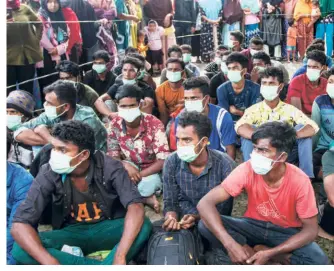  ?? ?? ROHINGYA REFUGEES at a temporary shelter in North Aceh, Indonesia, on November 16, 2022.