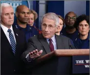  ?? (AP/Alex Brandon) ?? Dr. Anthony Fauci, director of the National Institute of Allergy and Infectious Diseases, speaks Sunday during a briefing on the coronaviru­s in the James Brady Press Briefing Room of the White House. He is joined by Vice President Mike Pence (left).