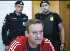  ?? ASSOCIATED PRESS FILES ?? Russian opposition leader Alexei Navalny speaks to the media on Aug. 22, 2019, prior to a court session in Moscow.