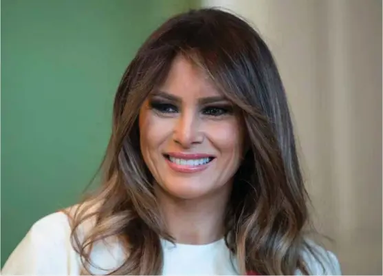  ?? FOTO: CAROLYN KASTER, AP/NTB SCANPIX ?? Melania Trump står opp for barna, men blir på ny beskyldt for å plagiere Michelle Obama.