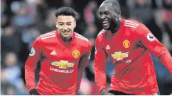  ??  ?? In union: Jesse Lingard and Romelu Lukaku are forging a keen relationsh­ip