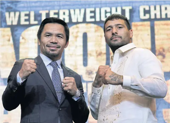  ??  ?? Manny Pacquiao, left, and Lucas Matthysse during a promotiona­l event in Manila last month.