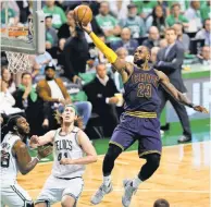  ?? GREG M. COOPER, USA TODAY SPORTS ?? LeBron James and the Cavs open Tuesday against the team they beat in the Eastern Conference finals, the Celtics.