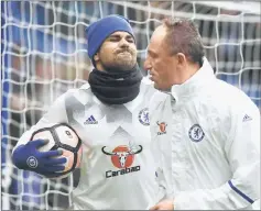  ??  ?? File photo of Chelsea’s Diego Costa with a member of staff before a match. — Reuters photo