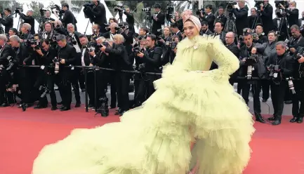  ??  ?? DEEPIKA Padukone poses on the red carpet at the 72nd Cannes Film Festival yesterday before the screening of
| REGIS DUVIGNAU Reuters