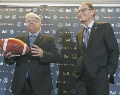  ?? JACK BOLAND/FILES ?? Jim Popp, left, and Marc Trestman meet with the press in Toronto on Feb. 28. The general manager and head coach joined the Toronto Argonauts well into the CFL’s most recent off-season, but they found a way to win the East Division and get the team...