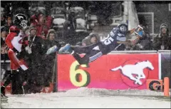  ?? CP PHOTO NATHAN DENETTE ?? Toronto Argos wide receiver DeVier Posey dives into the end zone for a touchdown during Sunday’s Grey Cup against the Calgary Stampeders in Ottawa. Posey was named Grey Cup MVP.