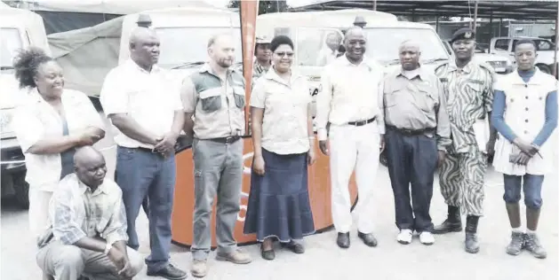  ??  ?? Second from L Kafue region senior warden Phanwell Moonga, GRI CEO Sport Beattie, and PS Dr Liya Mutale followed by DNPW director Paul Zyambo