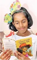  ??  ?? A book of hope by 10-year-old author Reshmi. Pic by Indika Handuwala