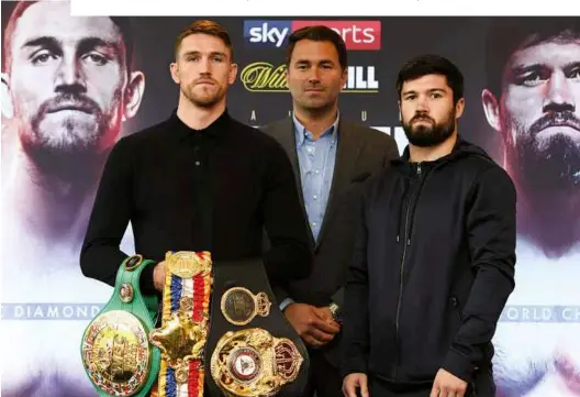  ??  ?? LEADING MEN: Promoter Eddie Hearn is flanked by Smith [left] and Ryder