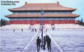  ??  ?? Crew filming at the Forbidden City