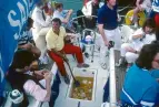  ??  ?? Bob Fisher hosting his famous cocktail party on his yacht at Cowes Week in 1991