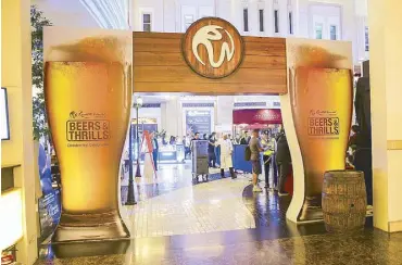  ??  ?? Through the looking glass: “Beers &amp; Thrills” is ongoing at Resorts World Manila until Oct. 31.