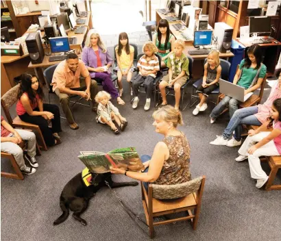  ??  ?? Bringing animals into the classroom not only enriches the learning environmen­t but also encourages student developmen­t.